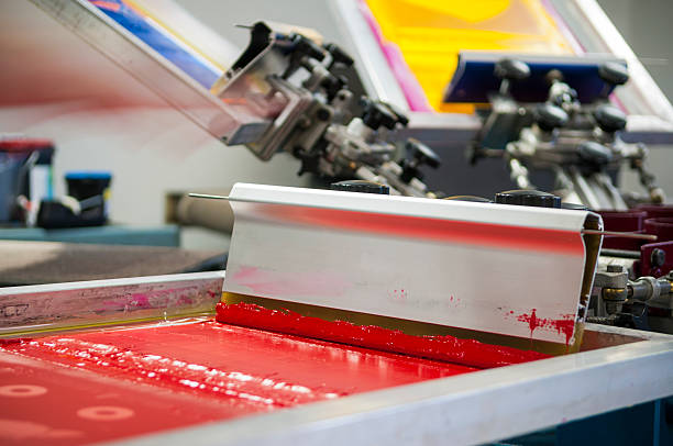 screen printing/silk screening squeegee in red ink